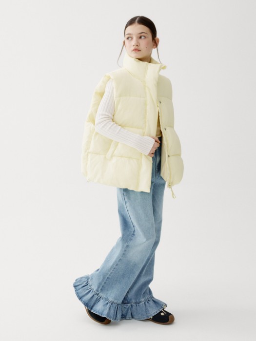 демисезонный стеганый жилет для девочек от бренда sela вид слева