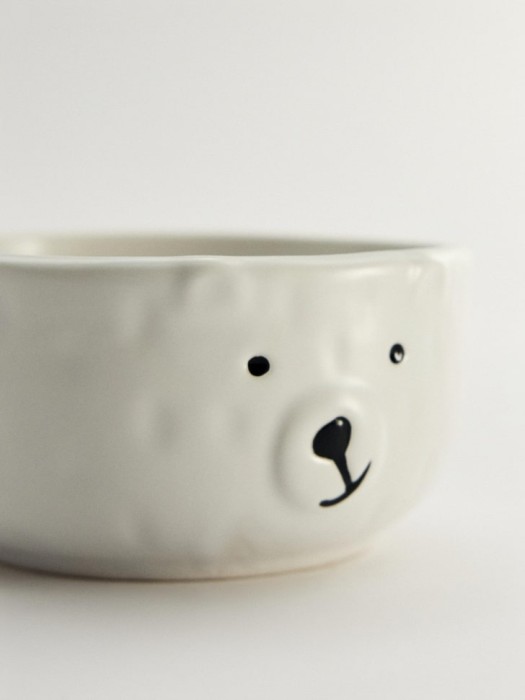 детская глубокая тарелка из фарфора от бренда sela вид слева