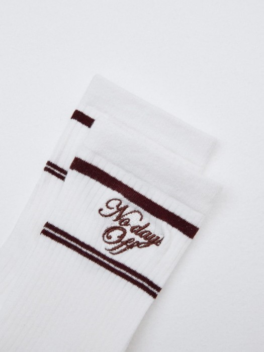 длинные носки с полосками от бренда sela вид слева