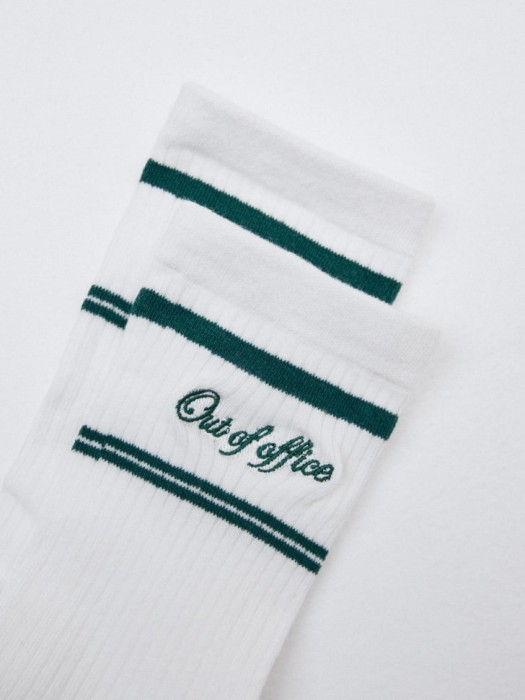 длинные носки с полосками от бренда sela вид слева