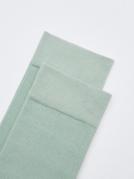 длинные носки от бренда sela вид слева