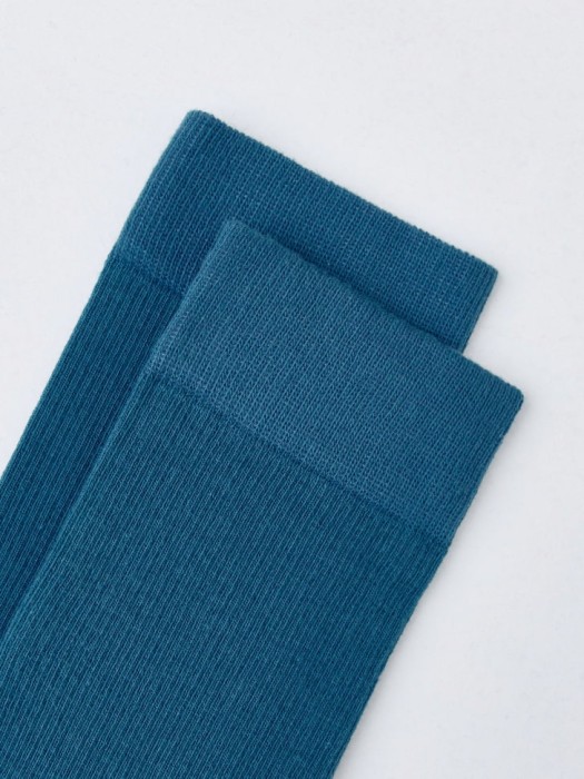 длинные носки от бренда sela вид слева