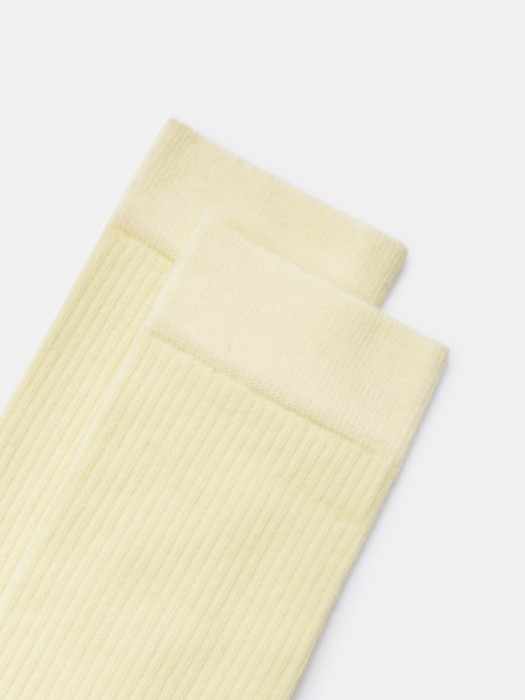 длинные носки от бренда sela вид слева