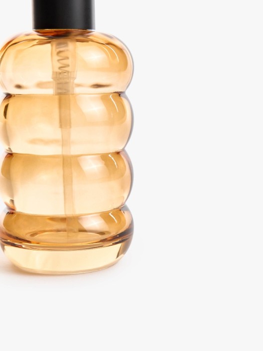 дозатор для жидкого мыла из стекла от бренда sela вид слева