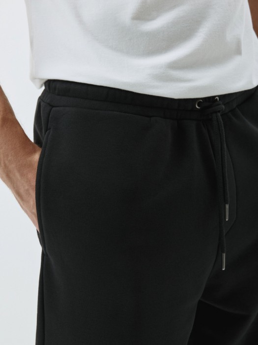 джоггеры из футера со средней посадкой из россии вид сбоку