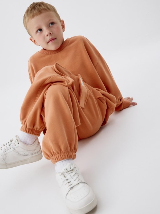 джоггеры карго детские от бренда sela вид слева