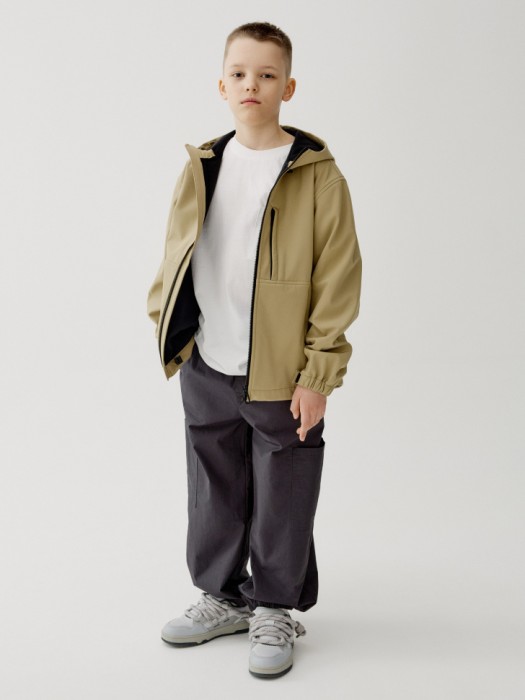 футболка оверсайз с карманом для мальчиков от бренда sela вид слева