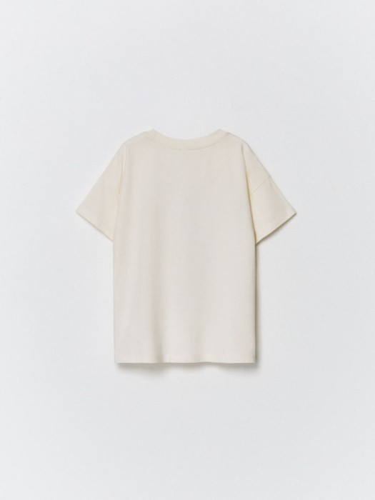 футболка оверсайз с принтом для девочек по цене 599 руб вид справа