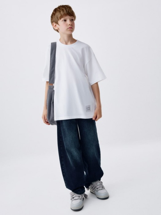 футболка оверсайз с принтом на спине детская от бренда sela вид слева