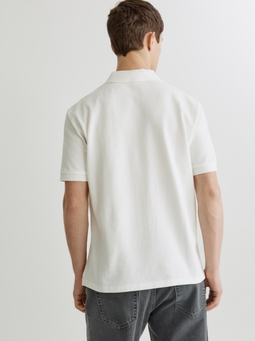 хлопковое поло прямого кроя по цене 1999 руб вид справа