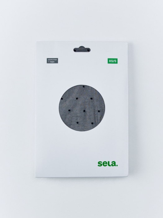 капроновые колготки в горошек от бренда sela вид слева