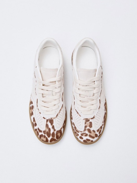 кеды из натуральной замши и меха пони от бренда sela вид слева