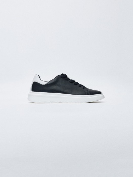 комбинированные кеды из натуральной кожи от бренда sela вид слева