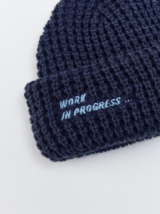 короткая шапка бини детская от бренда sela вид слева