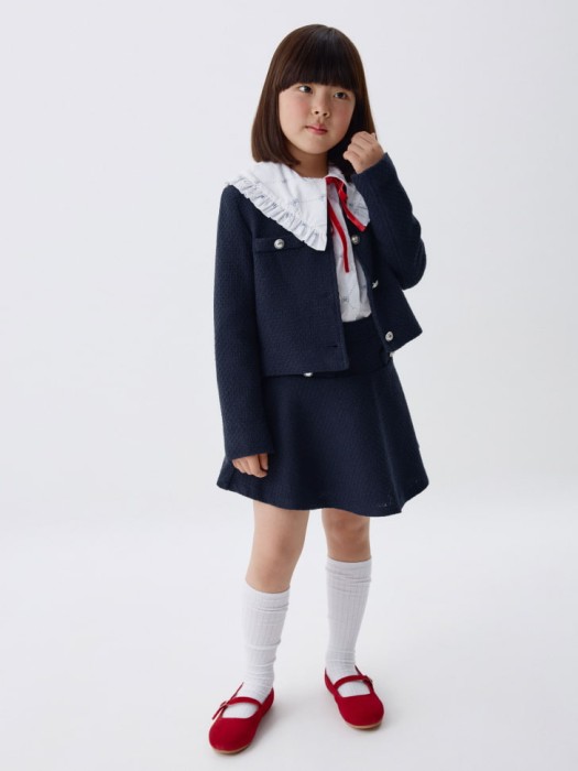 короткая твидовая юбка для девочек от бренда sela вид слева