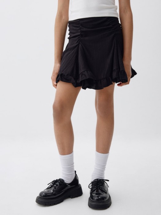 короткая юбка с драпировкой для девочек от бренда sela вид слева