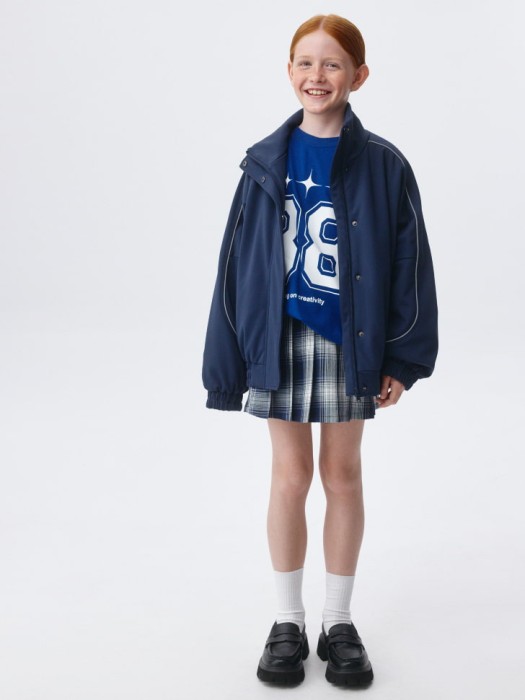 короткая юбка-шорты в складку для девочек от бренда sela вид слева