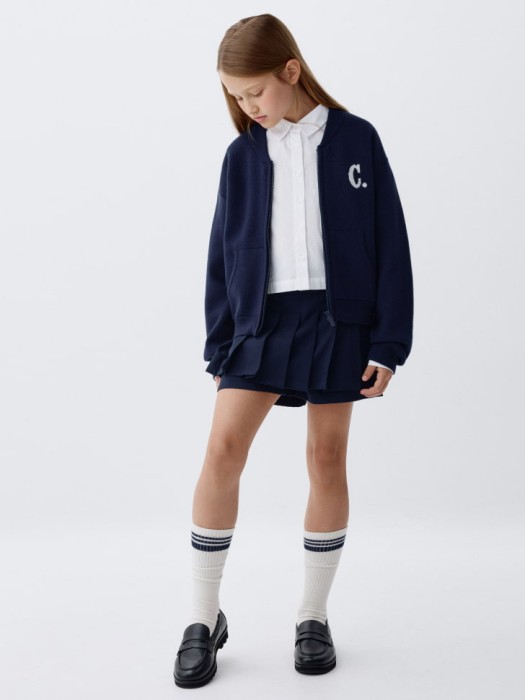 короткая юбка-шорты в складку для девочек от бренда sela вид слева