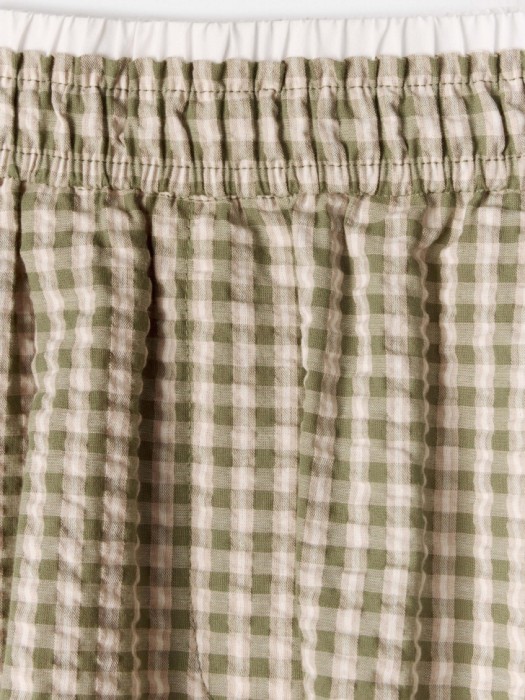 короткие шорты в клетку от бренда sela вид слева