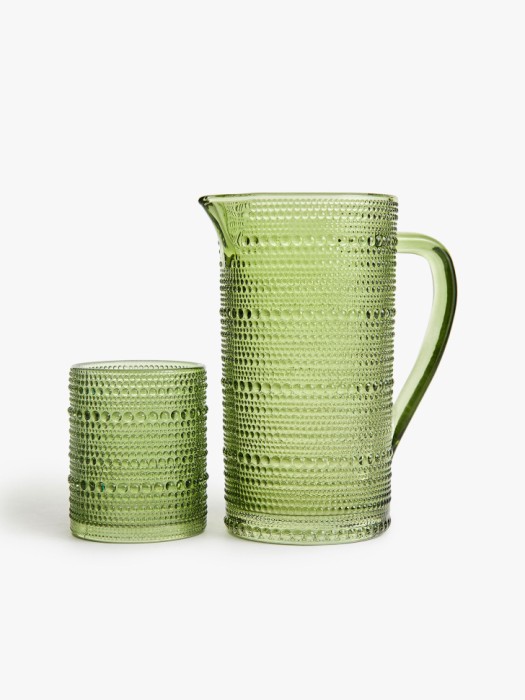 кувшин из стекла с рельефным узором от бренда sela вид слева