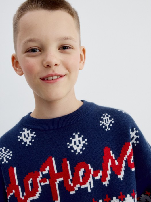 новогодний вязаный джемпер детский для детского возраста с изнаночной стороны