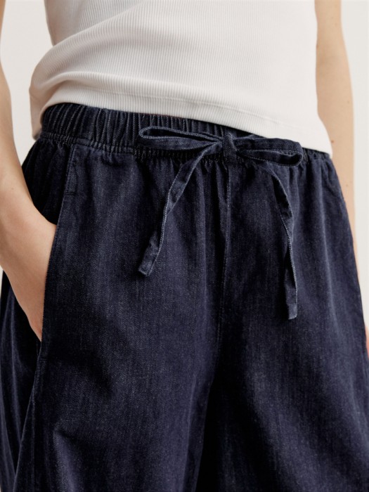 объемные джинсы с эластичным поясом из россии вид сбоку