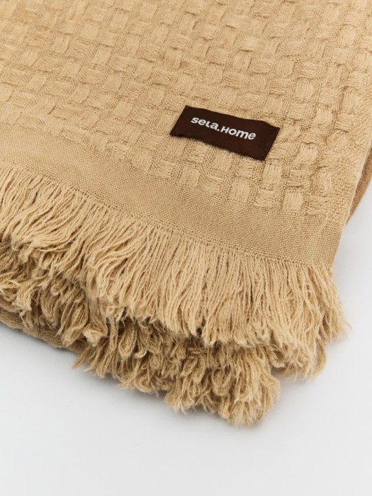 плед с бахромой от бренда sela вид слева