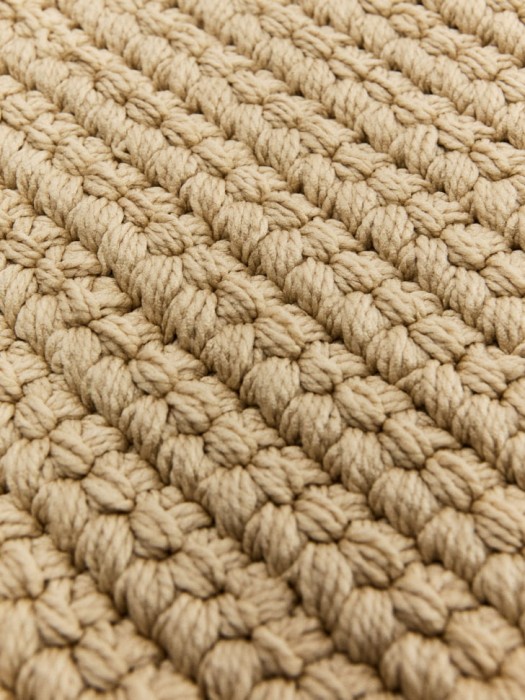 плетеный ковер от бренда sela вид слева
