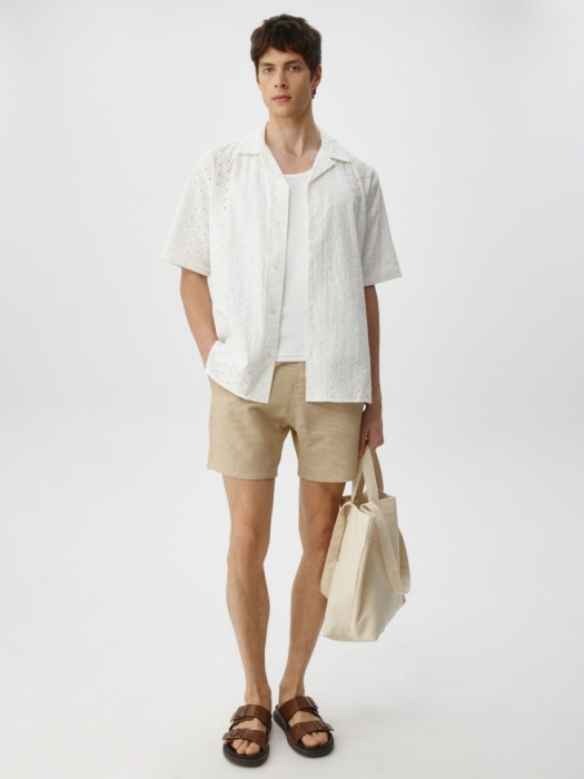 пляжные шорты в полоску от бренда sela вид слева