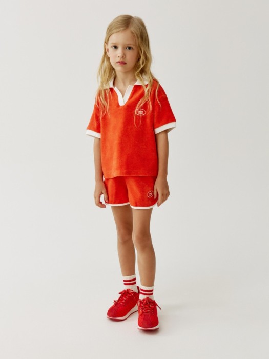 поло из махровой ткани для девочек от бренда sela вид слева