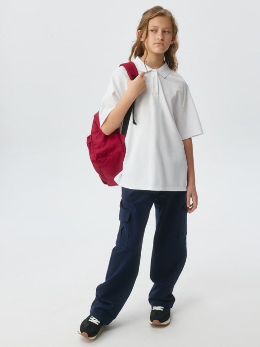 поло оверсайз с короткими рукавами для девочек от бренда sela вид слева