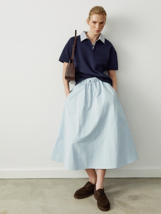 поло оверсайз с воротником в клетку из пике от бренда sela вид слева