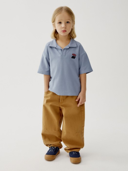 поло с коротким рукавом для мальчиков от бренда sela вид слева