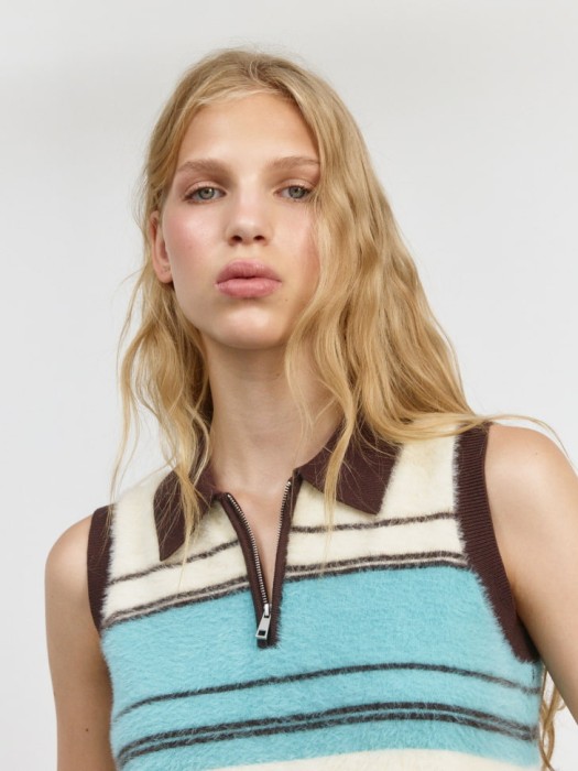 пушистый жилет из линейки  young по цене 1999 руб вид справа