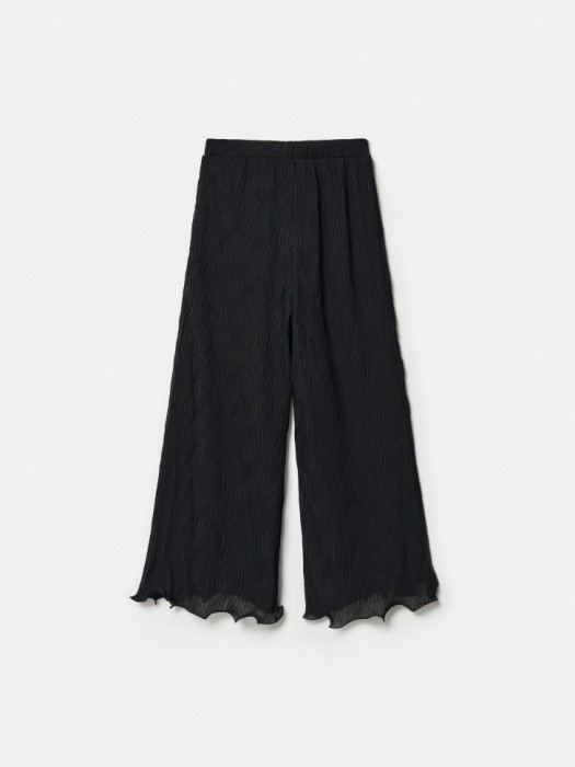 расклешенные брюки из фактурной ткани для девочек из россии вид сбоку