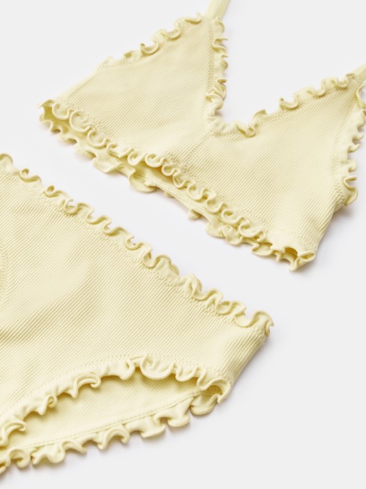 раздельный купальник с оборками для девочек от бренда sela вид слева