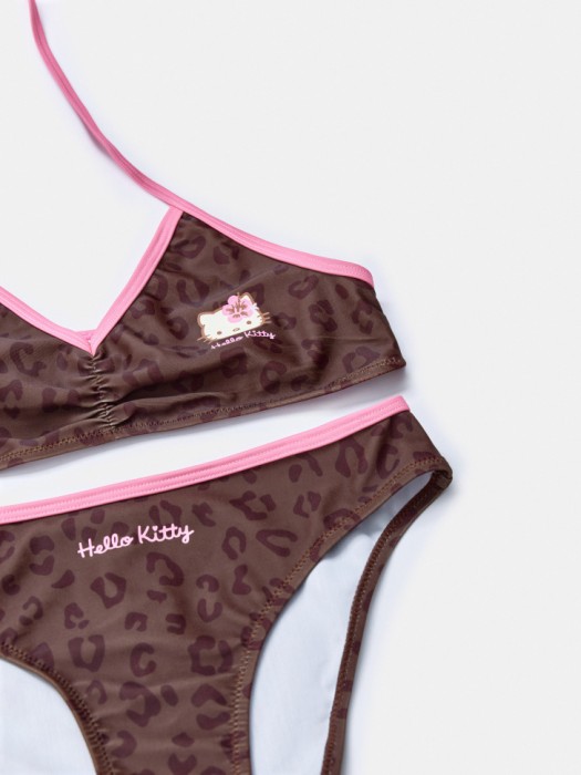 раздельный купальник с принтом hello kitty для девочек от бренда sela вид слева