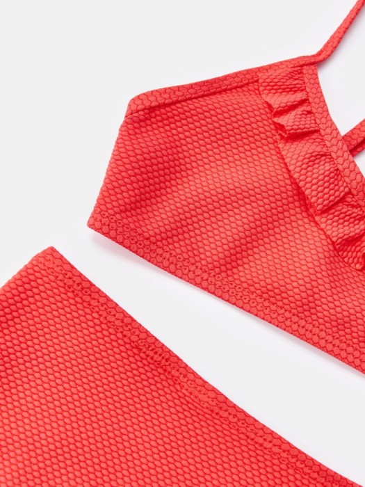 раздельный купальник с шортиками для девочек от бренда sela вид слева