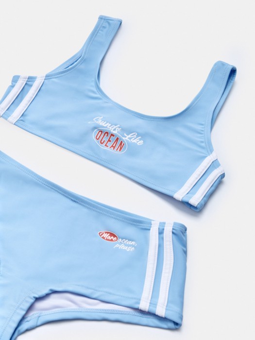 раздельный купальник с шортиками для девочек от бренда sela вид слева