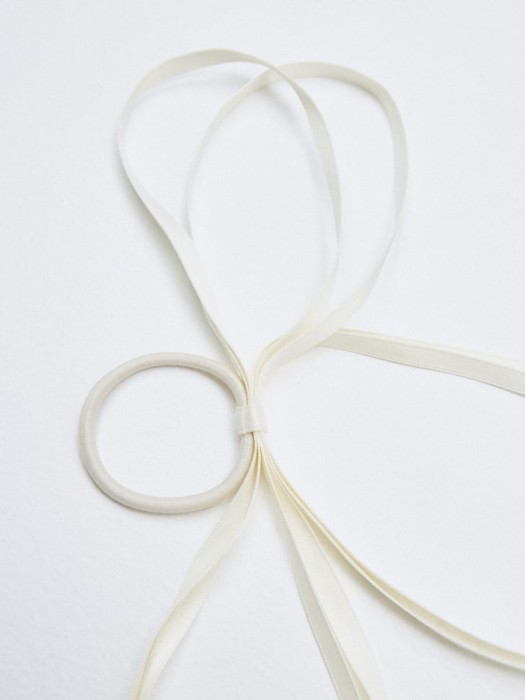 резинка для волос с бантом для девочек от бренда sela вид слева