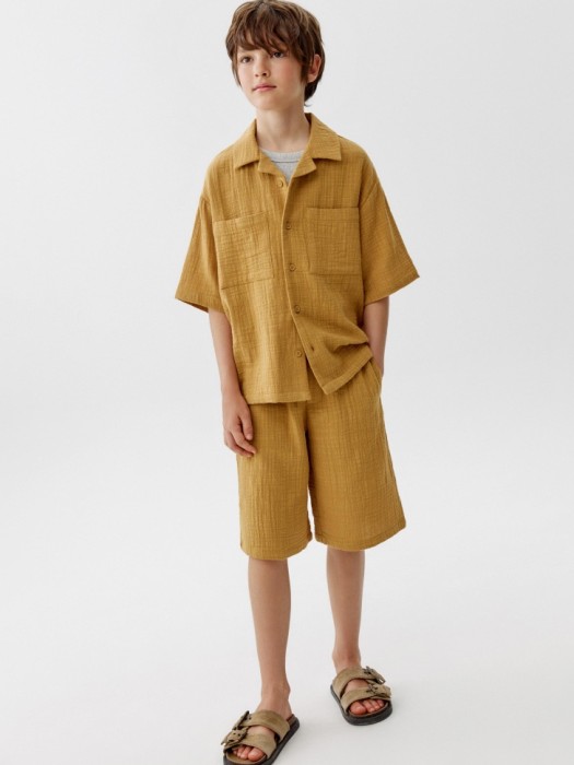 рубашка из муслина с коротким рукавом для мальчиков от бренда sela вид слева