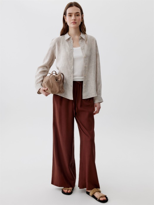 рубашка оверсайз из льна от бренда sela вид слева