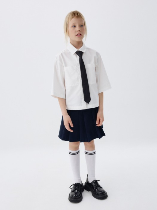 рубашка оверсайз с коротким рукавом для девочек от бренда sela вид слева