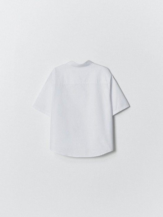 рубашка оверсайз с коротким рукавом для мальчиков от бренда sela вид слева