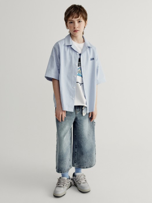 рубашка оверсайз с коротким рукавом для мальчиков от бренда sela вид слева