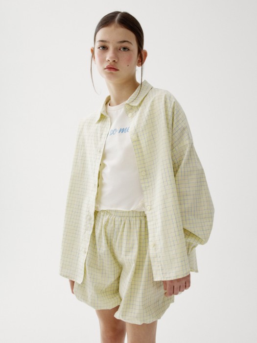рубашка оверсайз в клетку для девочек от бренда sela вид слева
