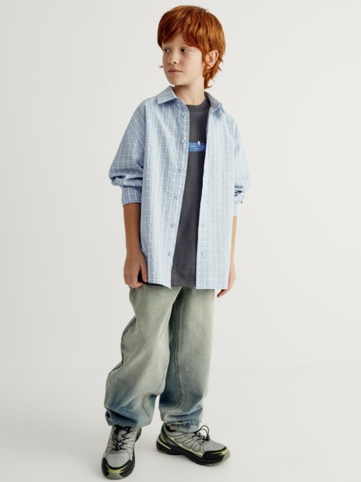 рубашка оверсайз в клетку для мальчиков от бренда sela вид слева