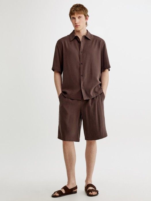 рубашка с коротким рукавом от бренда sela вид слева