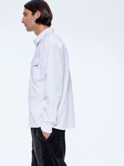 рубашка свободного кроя из ткани с жатым эффектом из россии вид сбоку