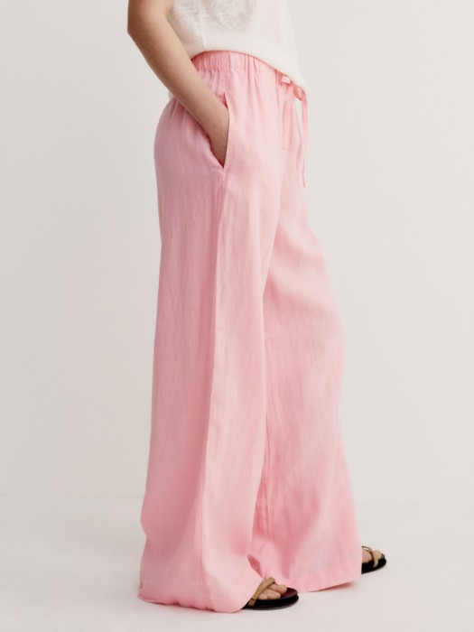 широкие брюки из 100% льна из россии вид сбоку